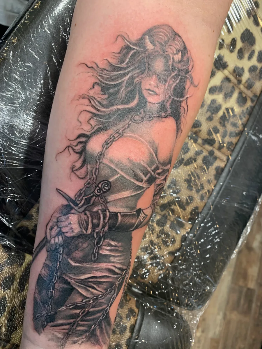 Guerrière Enchaînée : un tatouage entre puissance et symbolisme - photo 2