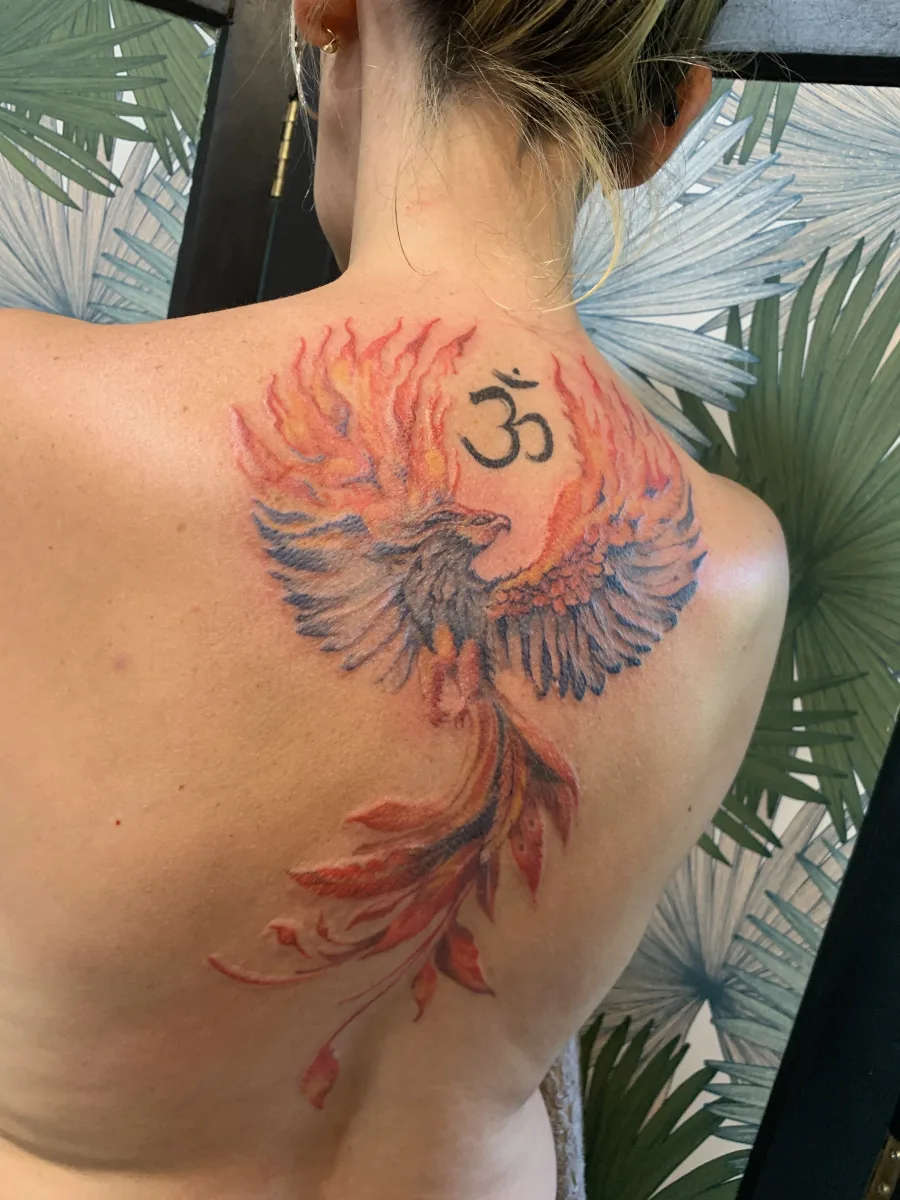 Phœnix aquarelle : un tatouage de renaissance aux couleurs vivantes - photo 2