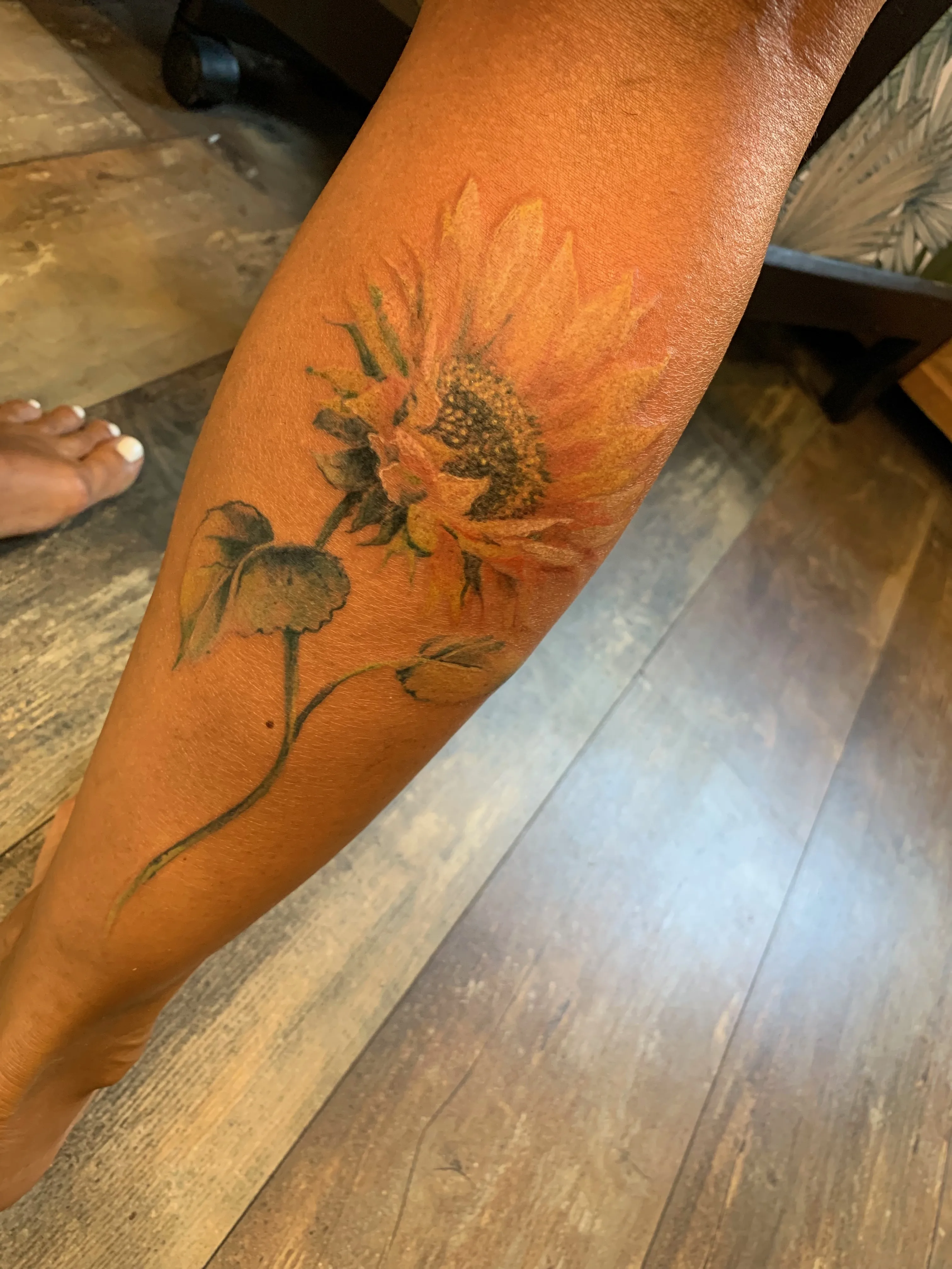 Tatouage Tournesol : une création sur mesure signée Jull's - photo